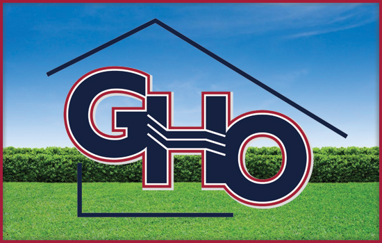 GHO Development Corporation Logo in front of a yard facade